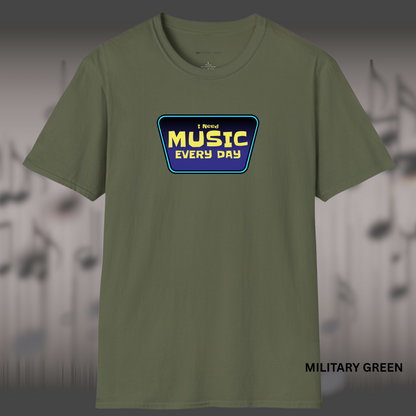 A trapezoid-shaped badge with the words “I Need MUSIC EVERY DAY” in bold yellow letters on a purple background, outlined in electric blue.