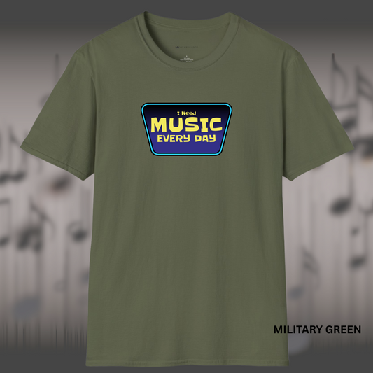 A trapezoid-shaped badge with the words “I Need MUSIC EVERY DAY” in bold yellow letters on a purple background, outlined in electric blue.