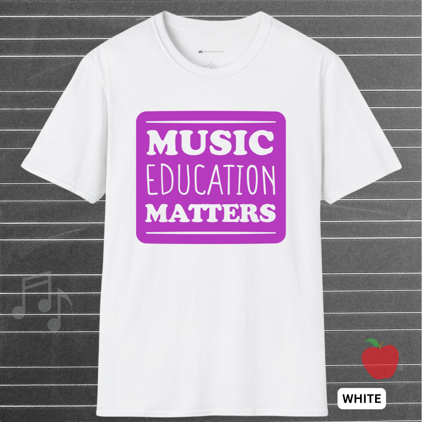 White t-shirt with 'Music Education Matters' in purple on a gray background with musical notes and an apple icon.